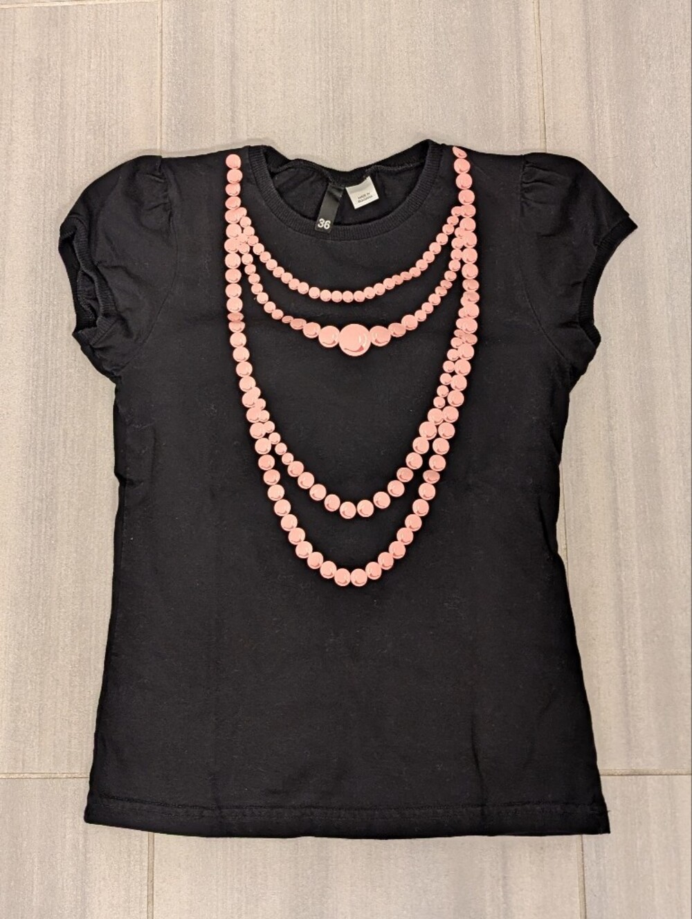 Black Short Sleeve Top with Pink Beaded Necklace Detail